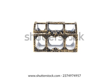 Small gold and glass treasure chest isolated over white