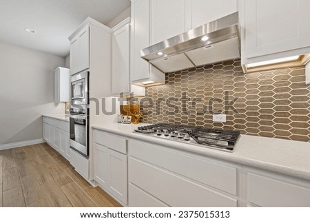 dallas, texas- august 6th 2023: a home kitchen  Royalty-Free Stock Photo #2375015313