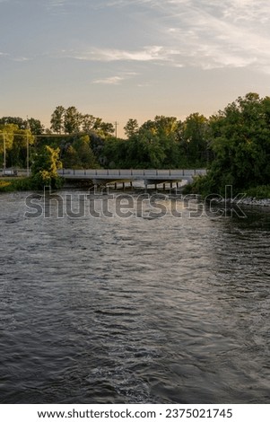 Bridge over the Otter Tail River in the Summertime in rural Minnesota, United States.

