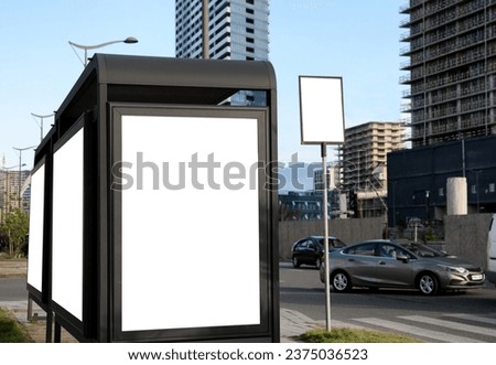 Bus stop with empty signboards in city. Mock-up for design