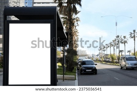 Bus stop with empty signboard in city. Mock-up for design