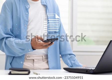 person using smartphone with ducument electronic signature at workplace, Electronic Signature data reference concept