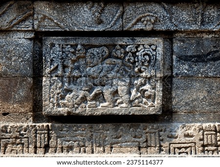 Ancient stone reliefs at Hindu temple