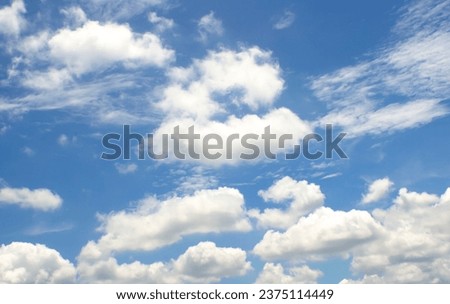 blue sky bright white clouds