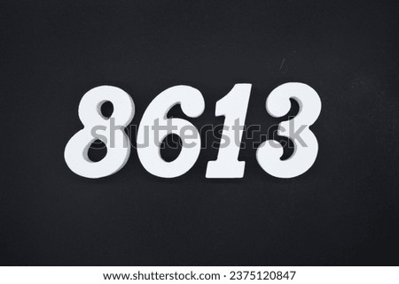 Black for the background. The number 8613 is made of white painted wood.