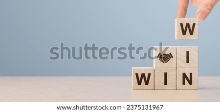 Win Win Strategy Solution. Business Partners Agreement, Partnership, Deal. Business with Successful Winwin Benefit. Cubes with handshake icon and win-win situation. Strategy and business concept. Royalty-Free Stock Photo #2375131967