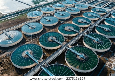 Aerial view of Drinking Water Treatment plants. Microbiology of drinking water production and distribution for big city from water management, water recycling. Royalty-Free Stock Photo #2375136129