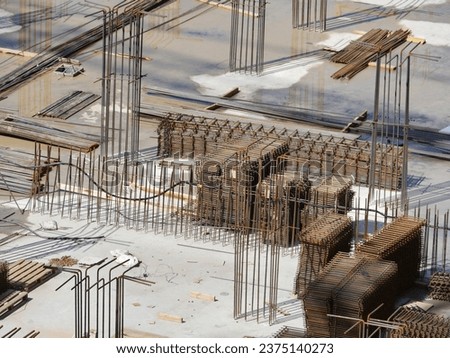 steel reinforcement, reinforcing steel bar stack on construction site top view Royalty-Free Stock Photo #2375140273