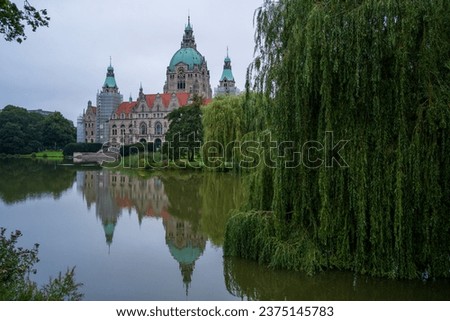 Picture of town hall of Hanover with reflection on the water in germany