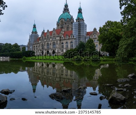 Picture of town hall of Hanover with reflection on the water in germany