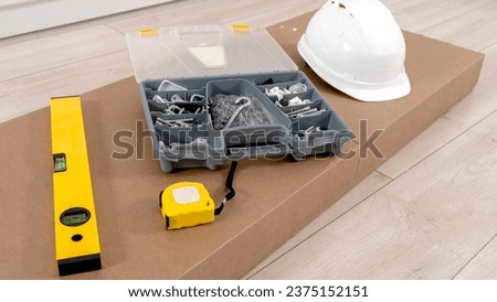accessories for assembling furniture before assembly. High quality photo Royalty-Free Stock Photo #2375152151