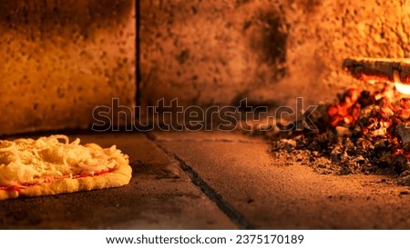 Italian pizza baked in a wood oven.Traditional Italian food. Copy space image.