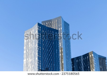 The skyscrapers of Deansgate Square apartment complex pictured under a blue sky in Manchester in October 2023.