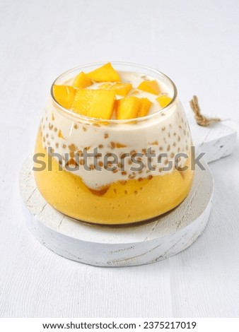 mango sago creamy in a glass on a white background
