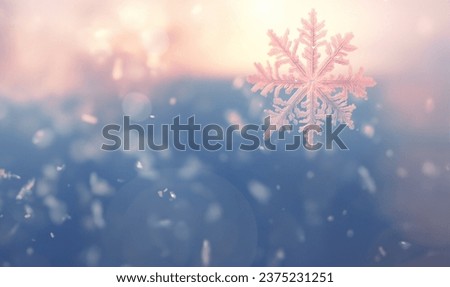 Winter snowy pastel wallpaper. Pink soft pastel gradient background with snowflakes. Cold and vivid illustration copy space space for text