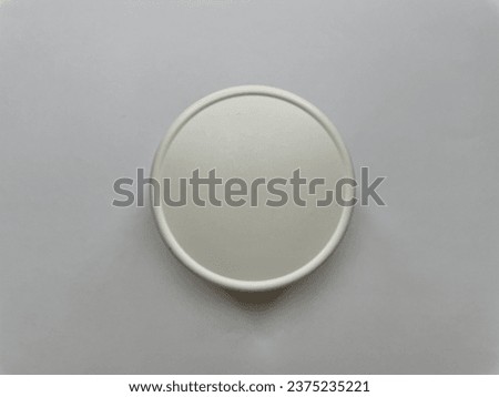 white jar for cream on a white background