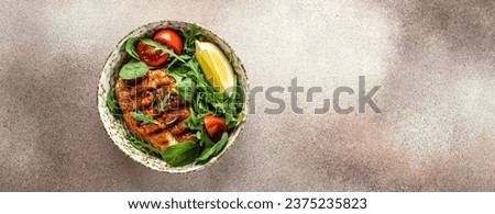 Roasted Chicken Fillet, green lettuce, arugula, tomatoes. Ketogenic diet. Low carb high fat breakfast. Healthy food concept. Long banner format. top view. Royalty-Free Stock Photo #2375235823
