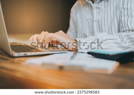 Young woman working on computer in office, Banner design. Business concept. hands using laptop.