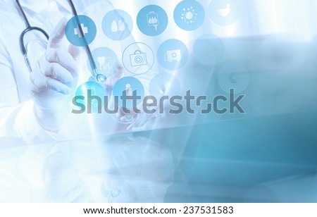 Medicine doctor hand working with modern computer interface as medical concept 