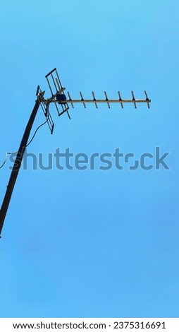 television antenna on the roof of the house