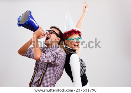 Nerdy man and nerdy woman are having party,It's time for party! Royalty-Free Stock Photo #237531790