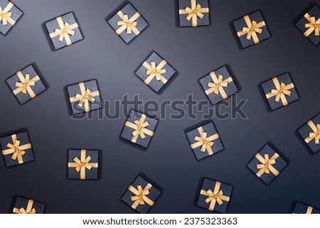 Holiday pattern. Celebration picture. Gray background with many gifts. Flat lay, top view.