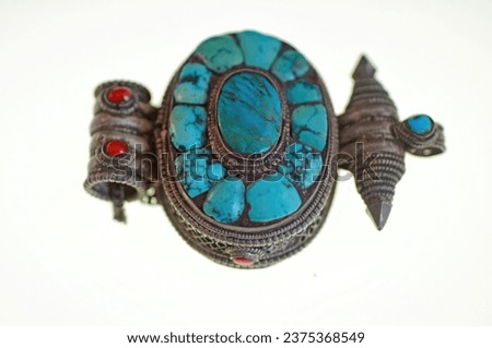 Turquoise and silver reliquary box from Tibet Royalty-Free Stock Photo #2375368549