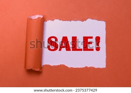 Sale Symbol. Big Discounts and Savings Concept. Red Sale Sign on Torn Paper. Special Offer, Clearance Sale Banner with Copy Space.