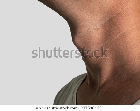 Anatomy of the laryngeal cartilage in men, Adam's apple in men selective focus close-up Royalty-Free Stock Photo #2375381331