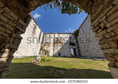 Yedikule Dungeons, also known as the Yedikule Fortress, is the golden gate at the junction of the Byzantine land walls. It is an important historical and touristic symbol of Istanbul on a sunny day Royalty-Free Stock Photo #2375383433