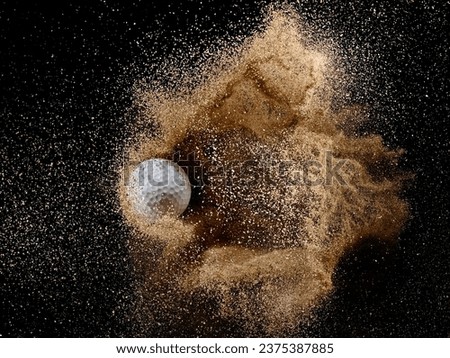Golf ball in dry sand explosion on black background