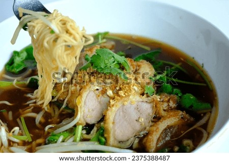 Egg noodles soups with duck