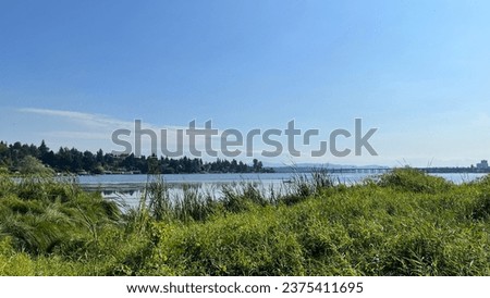Union Bay, Lake Washington, and the Evergreen Point Floating Bridge Royalty-Free Stock Photo #2375411695