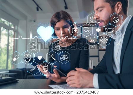 Businesspeople working together at office workplace. Concept of team work, business education, internet surfing, brainstorm, project information technology. Medical healthcare hologram