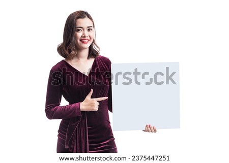 Beautiful young woman holding empty blank board on white background. Asian woman displaying gray banner. Your text here