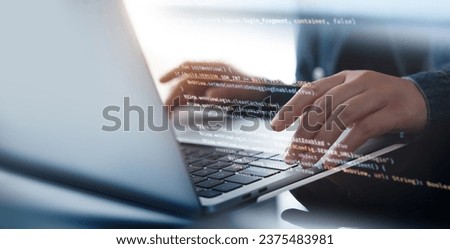 Software development concept. Coding programmer, software engineer working on laptop with javascript computer code on virtual screen, internet of things IoT, digital technology