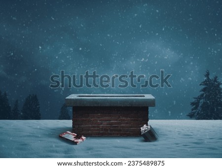 Santa was here: lost gifts next to a chimney on a roof on the show, Christmas Eve concept