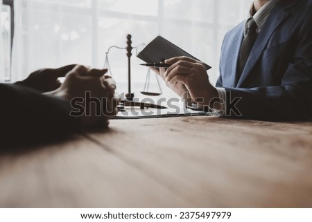 Lawyers provide legal advice. Clients who are being prosecuted by other parties receive counseling to fight cases with lawyers. Fight cases in court transparently. Concept of legal consultation. Royalty-Free Stock Photo #2375497979