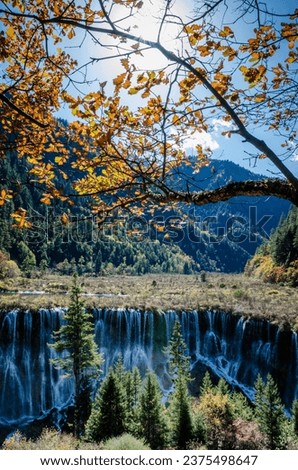 A picture of multiple waterfalls during fall or autumn