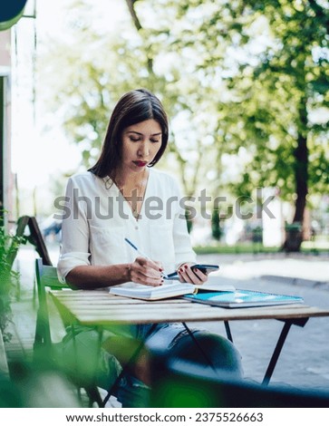 hipster girl chatting researching information for test