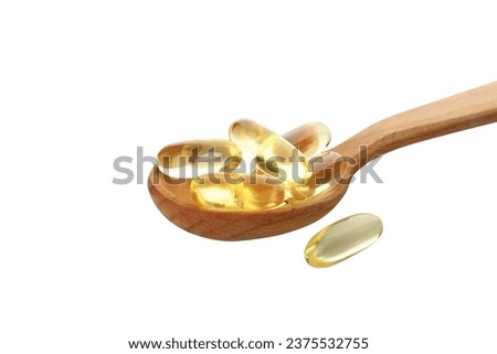 PNG,Wooden spoon with omega pills, isolated on white background