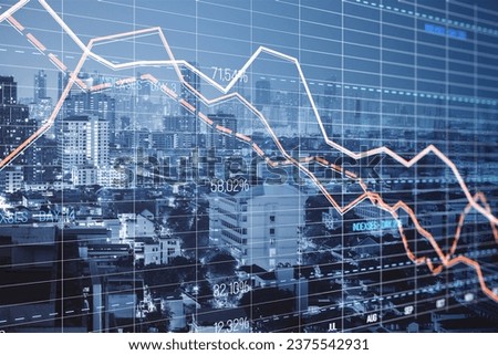 Creative glowing downward red forex chart on blurry city background. Crisis, and stock market fall concept. Double exposure
