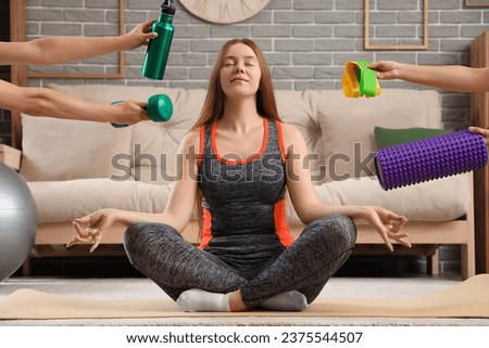 Meditating young woman and hands with sports equipment at home