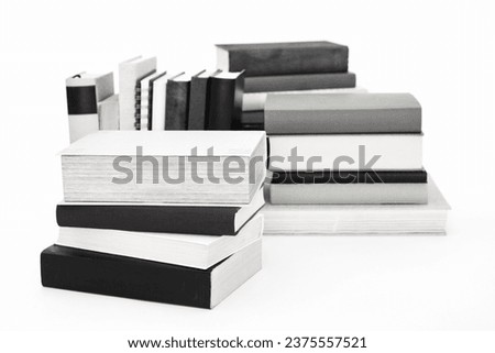 Stack of books on white black and white photo