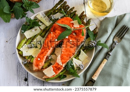 Salmon with Asparagus and Goat Cheese with sage and thyme Flat lay