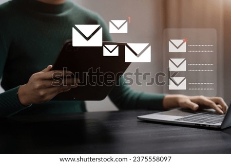 Business email marketing notification concept, Businesswoman use laptop receive message alert in the mailbox and transfer data at office.