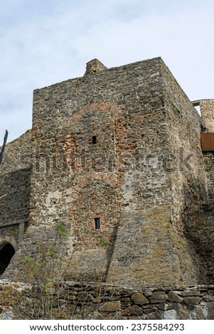 Abstract photo of a historic stone building. Castle ruins, historical, monuments, travel, vacation. Stone building.