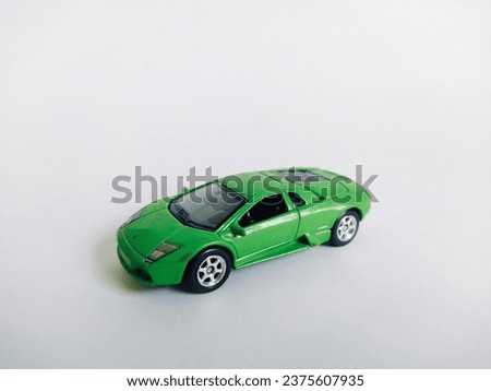 tiny toy cars isolated on a white background.