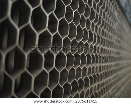 abstract background of metal grating. close-up. selective focus