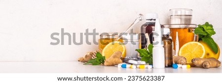 Medical and alternative herbal cold remedy. Set of various traditional natural cold remedies, tablets, pills  and syrups for colds and viruses Royalty-Free Stock Photo #2375623387